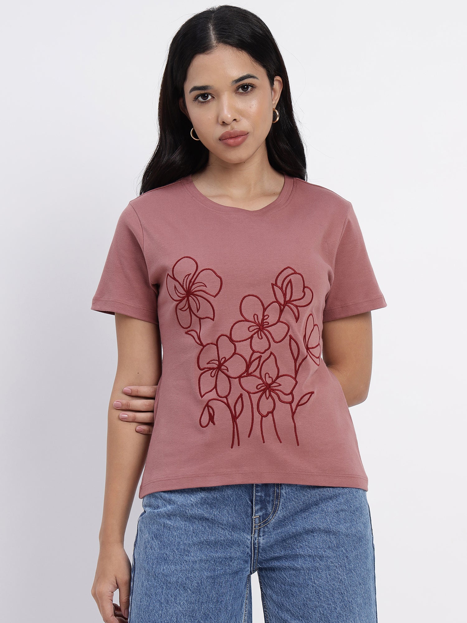 Salmon-colored T-shirt featuring white floral prints - 2783