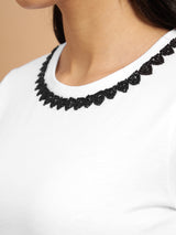 White regular top featuring elegant monochrome embellishments - 2846