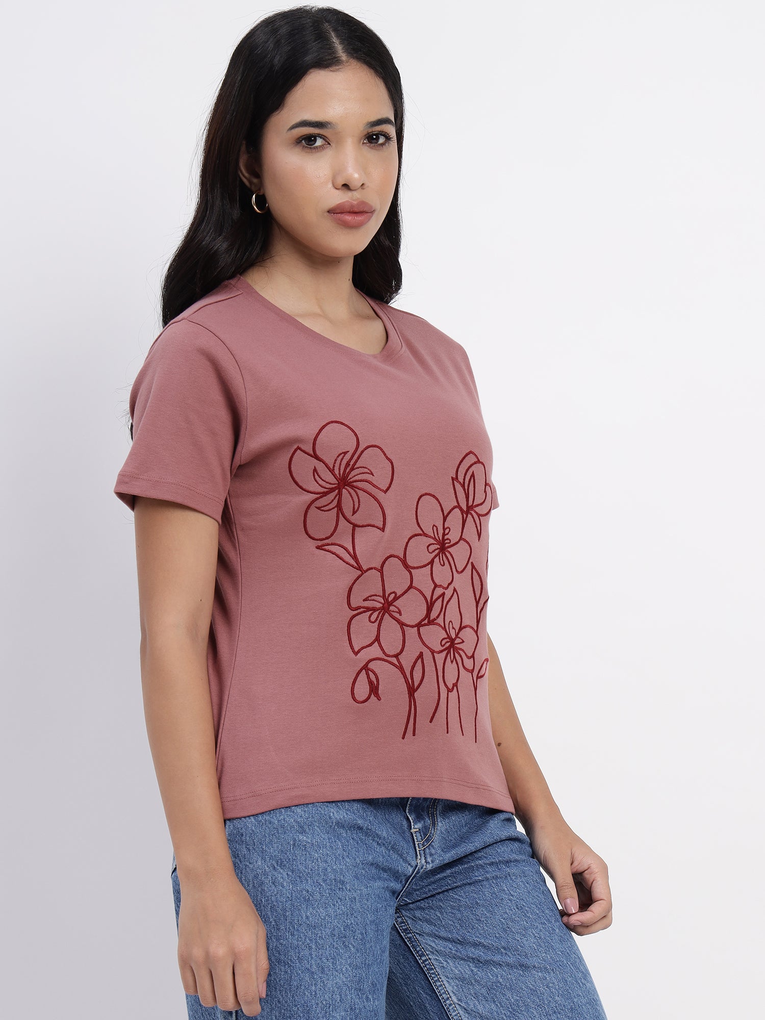 Salmon-colored T-shirt featuring white floral prints - 2783