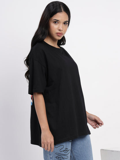 Oversized black cotton top featuring a vibrant tropical print -2849