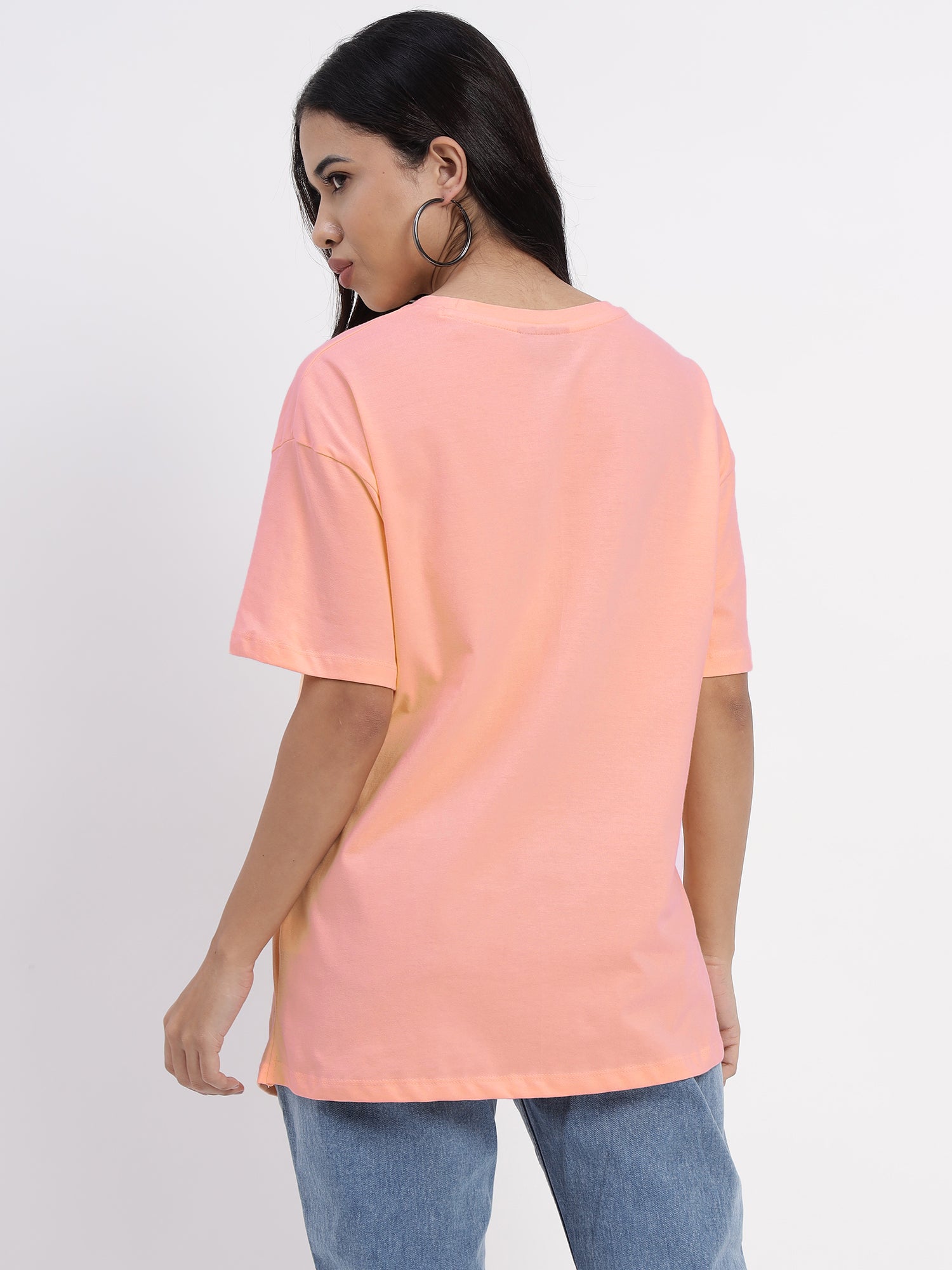 Peach-coloured T-shirt with abstract face print- 2774