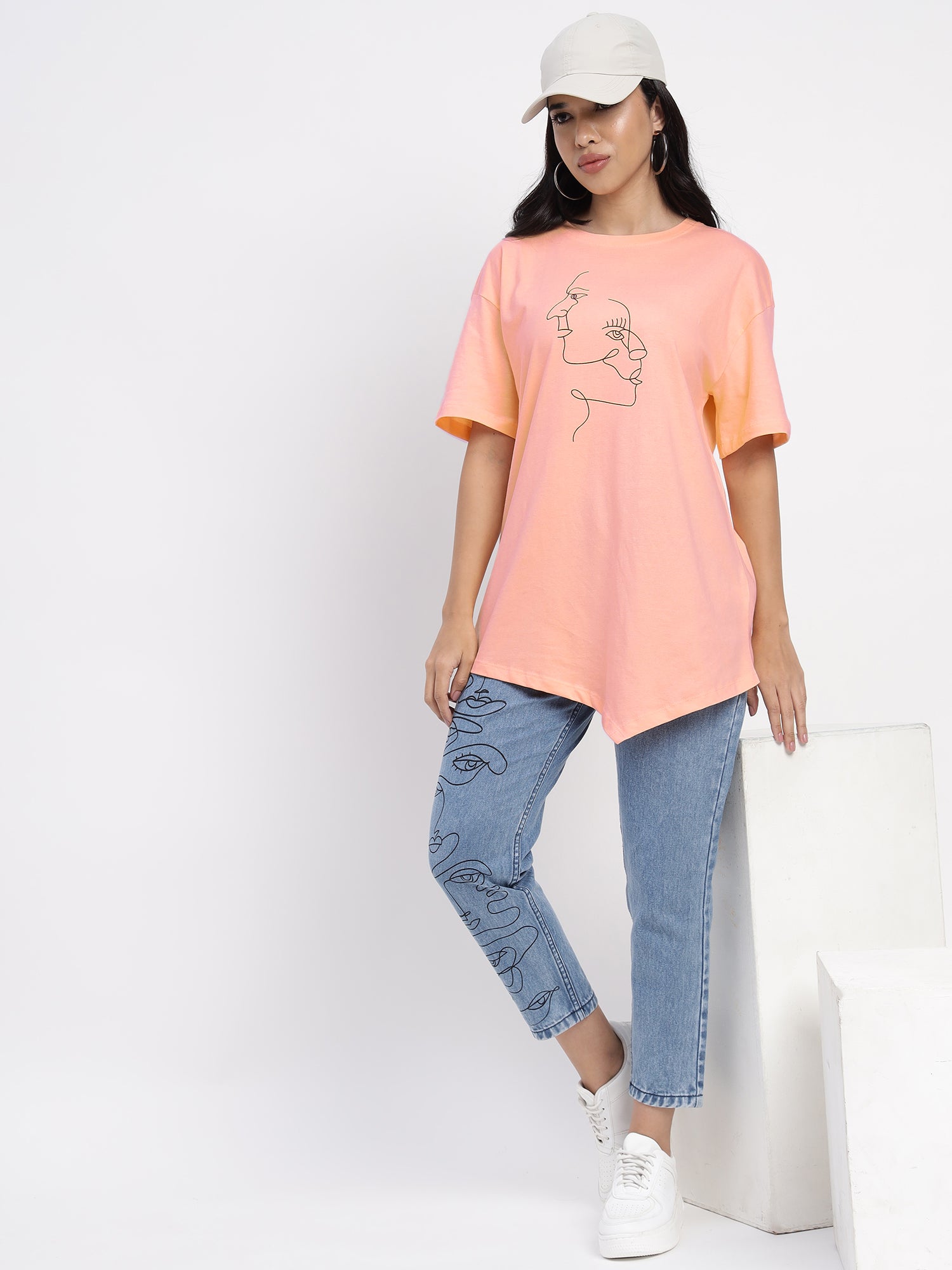 Peach-coloured  T-shirt with abstract face print- 2774